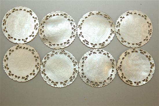 A collection of Chinese circular and oblong mother of pearl gaming counters,